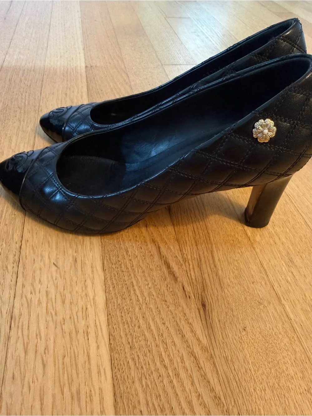 CHANEL Black Quilted Leather Cap-Toe Pumps with Patent CC